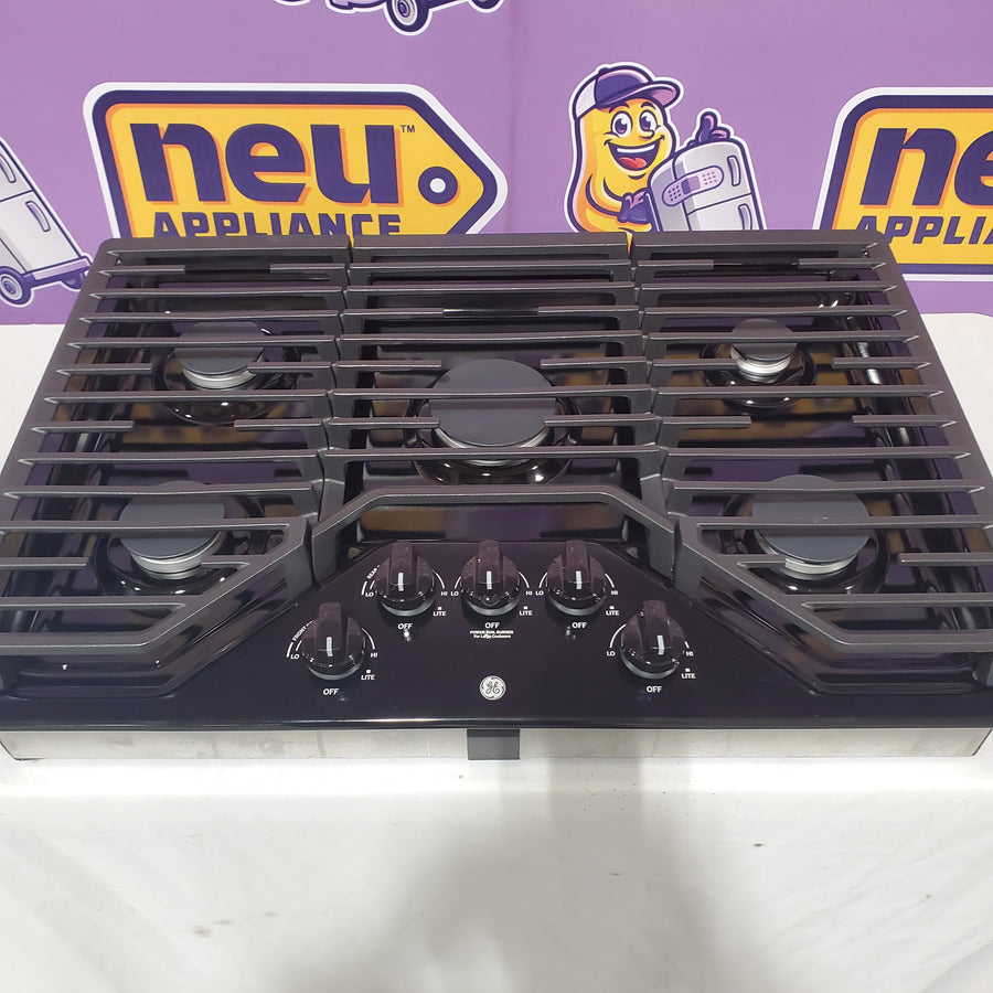 GE 30 in. Gas Cooktop in Black with 5-Burners including Power Burners JGP5030DLBB - Open Box