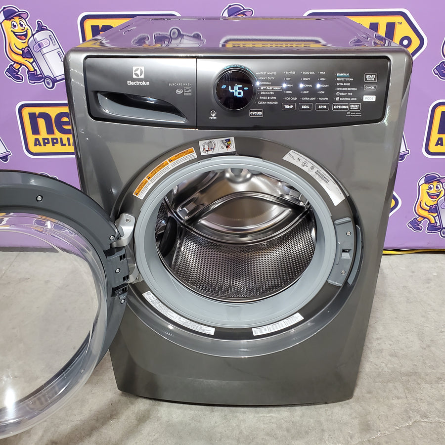Electrolux 400 Series Front Load Washer - 4.5 Cu. Ft. ELFW7437AT - Scratch & Dent (Minor) and Electrolux 8-cu ft Stackable Vented Electric Dryer with Steam Cycle in Titanium ELFE7437AT - Scratch & Dent (Moderate)