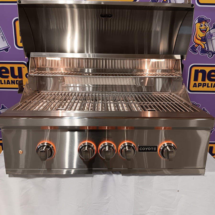 Coyote 36 Inch Built-In Grill with 3 Infinity Burners™, RapidSear™ Infrared Burner, 875 sq. in. Cooking Surface, Interior Grill Lighting, LED Illuminated Knobs, and Integrated Wind Guard C2SL36NG - Scratch & Dent (Moderate)