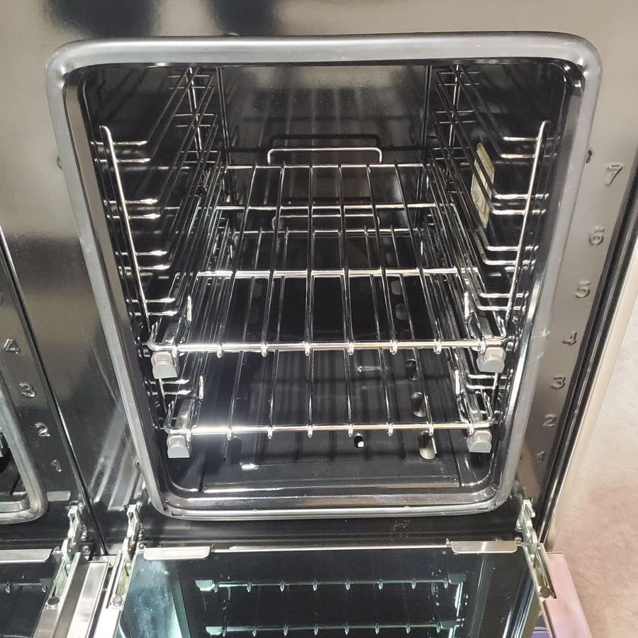 Bertazzoni 48 Inch Freestanding Gas Range with 6 Sealed Burners, 7.1 cu. ft. Total Capacity, Dual Convection, and Electric Griddle PRO486BTFGMXT - Scratch & Dent (Minor)
