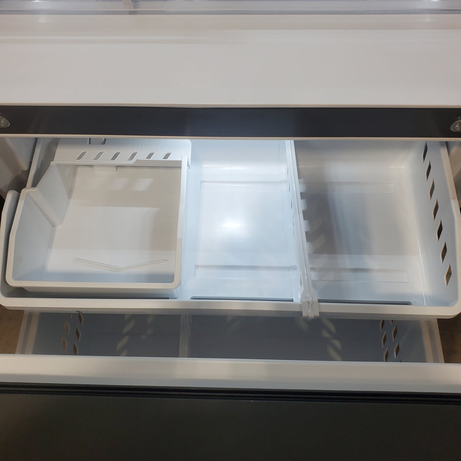 GE 36 in. Wide 21.9 Cu. Ft. French Door Counter Depth Refrigerator with Internal Water Dispenser in Stainless Steel GWE22JYMFS - Scratch & Dent (Moderate)