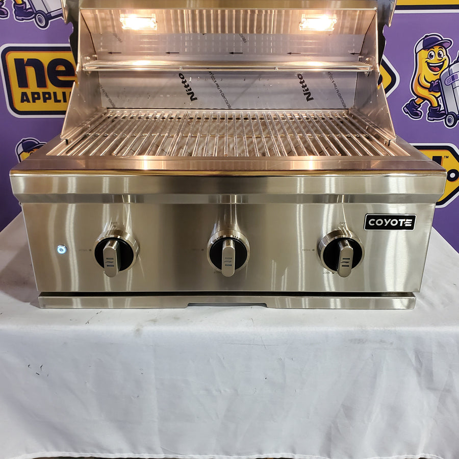 Coyote 30 Inch Built-In Stainless Steel Gas Grill with 640 sq. in. Total Cooking Area, 3 Burner, Interior Lighting, Integrated Windguard, and Smudge Proof Control Panel C3C30NG - Scratch & Dent (Minor)