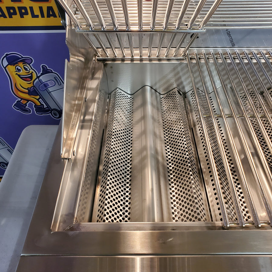 Coyote 30 Inch Built-In Stainless Steel Gas Grill with 640 sq. in. Total Cooking Area, 3 Burner, Interior Lighting, Integrated Windguard, and Smudge Proof Control Panel C3C30NG - Scratch & Dent (Minor)