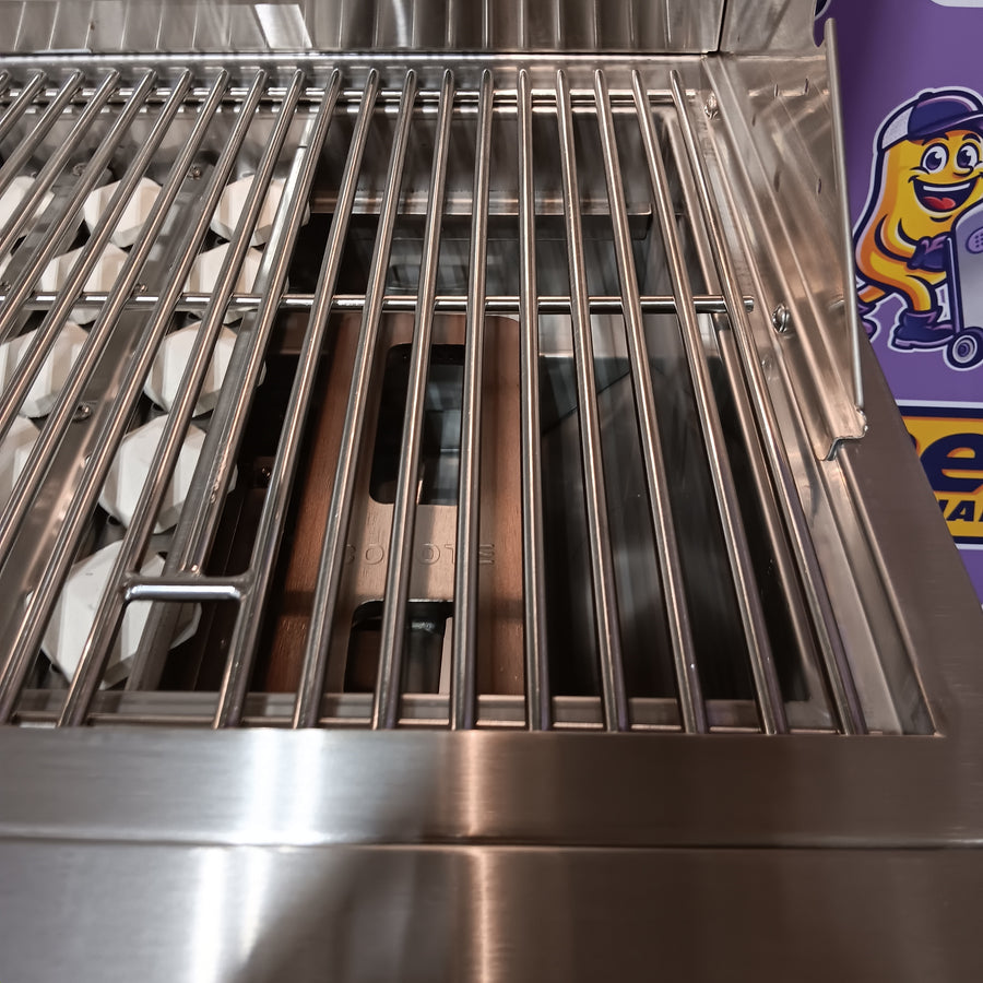 Coyote 36 Inch Built-In Grill with 3 Infinity Burners™, RapidSear™ Infrared Burner, 875 sq. in. Cooking Surface, Interior Grill Lighting, LED Illuminated Knobs, and Integrated Wind Guard C2SL36NG - Scratch & Dent (Moderate)