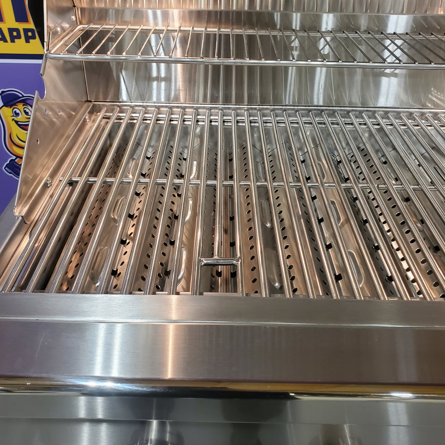 Coyote 36 Inch Built-In Grill with 4 Infinity Burners™, 875 sq. in. Cooking Surface, Interior Grill Lighting and Integrated Wing Guard C2C36NG - Open Box