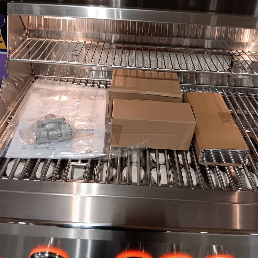 Coyote 36 Inch Built-In Grill with 3 Infinity Burners™, RapidSear™ Infrared Burner, 875 sq. in. Cooking Surface, Interior Grill Lighting, LED Illuminated Knobs, and Integrated Wind Guard C2SL36NG - Scratch & Dent (Moderate)