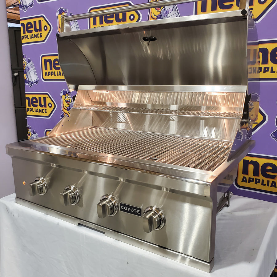Coyote 36 Inch Built-In Grill with 4 Infinity Burners™, 875 sq. in. Cooking Surface, Interior Grill Lighting and Integrated Wing Guard C2C36NG - Open Box