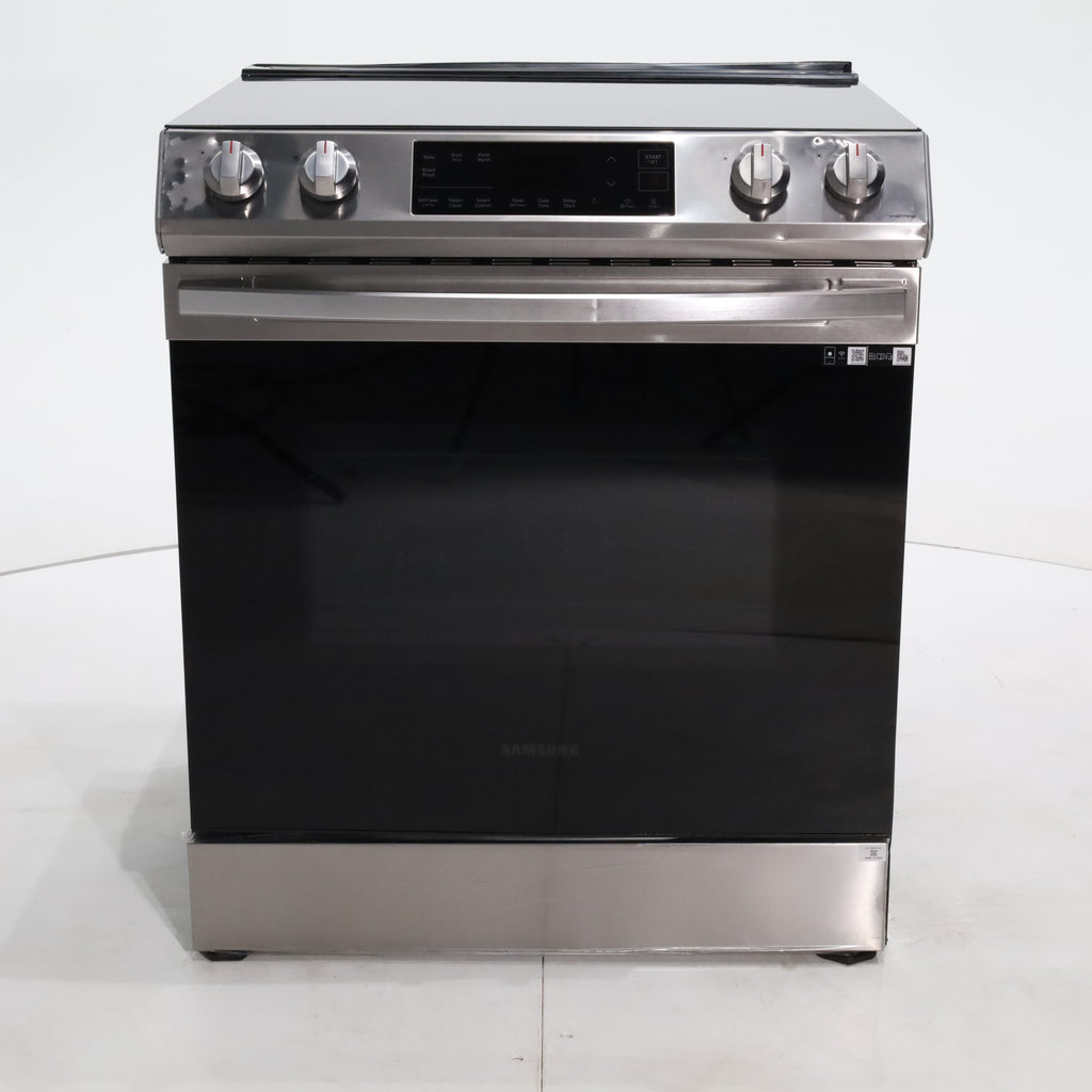 Pictures of Fingerprint Resistant Stainless Samsung 6.3 cu ft 5 Heating Element Smooth Cooktop Smart Slide In Electric Range with Smart Wifi Connectivity - Scratch & Dent - Moderate - Neu Appliance Outlet - Discount Appliance Outlet in Austin, Tx