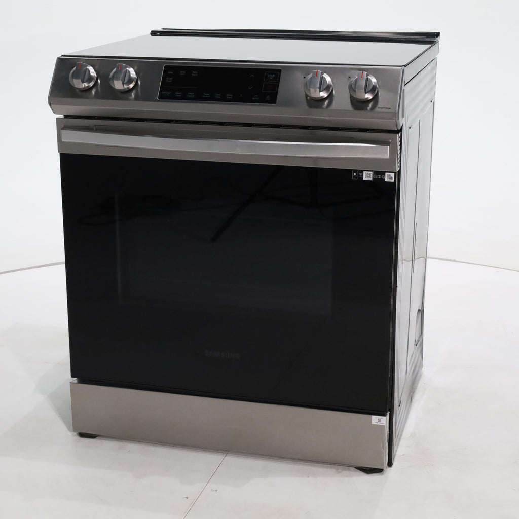 Pictures of Fingerprint Resistant Stainless Samsung 6.3 cu ft 5 Heating Element Smooth Cooktop Smart Slide In Electric Range with Smart Wifi Connectivity - Scratch & Dent - Moderate - Neu Appliance Outlet - Discount Appliance Outlet in Austin, Tx