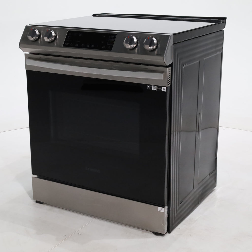 Pictures of Fingerprint Resistant Stainless Samsung 6.3 cu ft 5 Heating Element Smooth Cooktop Smart Slide In Electric Range with Smart Wifi Connectivity - Scratch & Dent - Moderate - Neu Appliance Outlet - Discount Appliance Outlet in Austin, Tx
