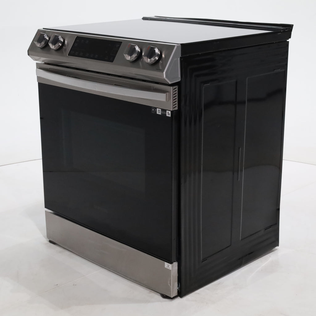 Pictures of Fingerprint Resistant Stainless Samsung 6.3 cu ft 5 Heating Element Smooth Cooktop Smart Slide In Electric Range with Smart Wifi Connectivity - Scratch & Dent - Moderate - Neu Appliance Outlet - Discount Appliance Outlet in Austin, Tx