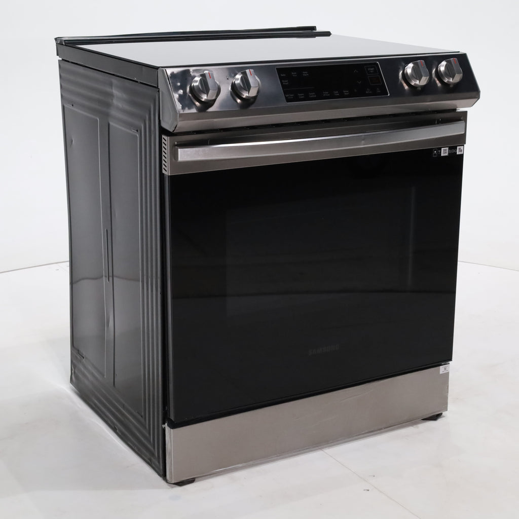 Pictures of Fingerprint Resistant Stainless Samsung 6.3 cu ft 5 Heating Element Smooth Cooktop Smart Slide In Electric Range with Smart Wifi Connectivity - Scratch & Dent - Moderate - Neu Appliance Outlet - Discount Appliance Outlet in Austin, Tx