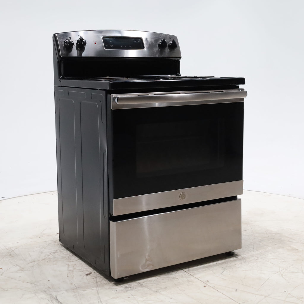 Pictures of Black with Stainless Steel GE 5.0 cu. ft. Freestanding 4 Element Electric Range with Sensi-Temp Technology - Certified Refurbished - Neu Appliance Outlet - Discount Appliance Outlet in Austin, Tx