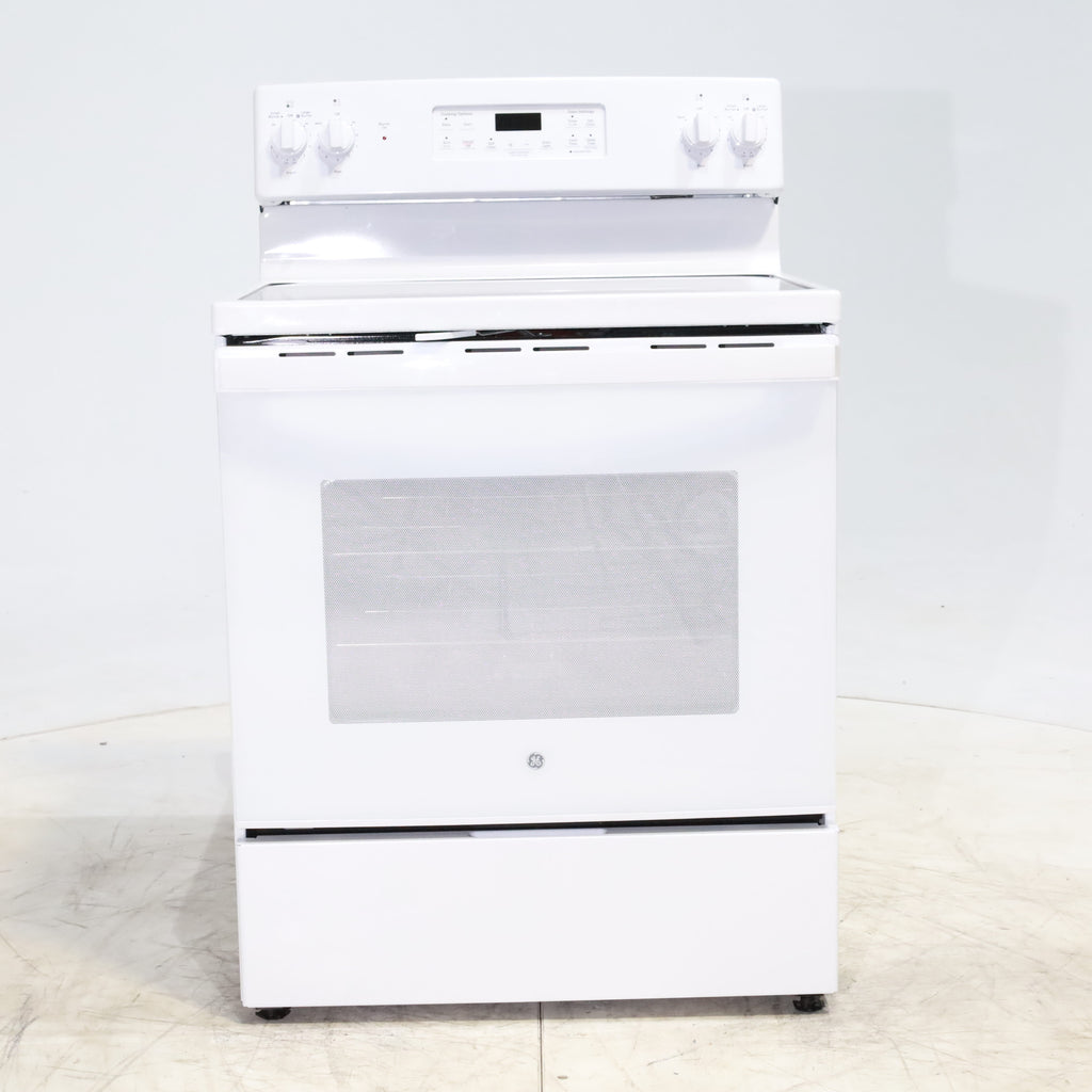 Pictures of White GE 5.3 cu. ft. 4 Element Freestanding Electric Range with Dual Element Baking - Scratch & Dent - Minor - Neu Appliance Outlet - Discount Appliance Outlet in Austin, Tx