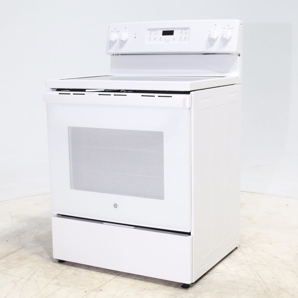 Pictures of White GE 5.3 cu. ft. 4 Element Freestanding Electric Range with Dual Element Baking - Scratch & Dent - Minor - Neu Appliance Outlet - Discount Appliance Outlet in Austin, Tx