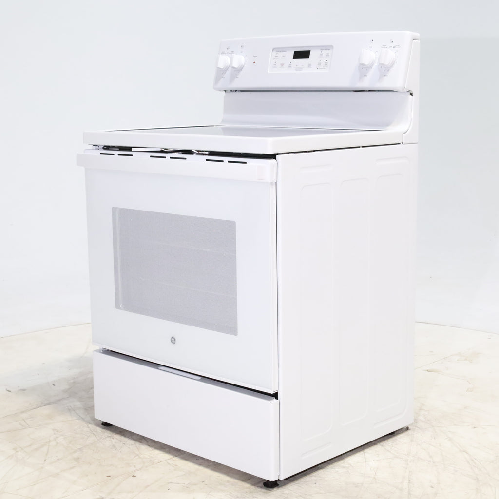 Pictures of White GE 5.3 cu. ft. 4 Element Freestanding Electric Range with Dual Element Baking - Scratch & Dent - Minor - Neu Appliance Outlet - Discount Appliance Outlet in Austin, Tx