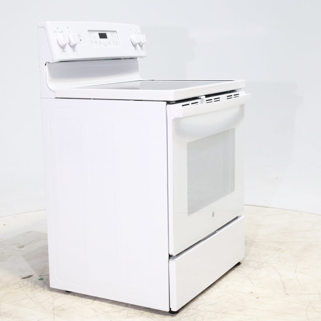 Pictures of White GE 5.3 cu. ft. 4 Element Freestanding Electric Range with Dual Element Baking - Scratch & Dent - Minor - Neu Appliance Outlet - Discount Appliance Outlet in Austin, Tx