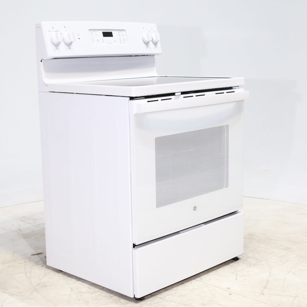 Pictures of White GE 5.3 cu. ft. 4 Element Freestanding Electric Range with Dual Element Baking - Scratch & Dent - Minor - Neu Appliance Outlet - Discount Appliance Outlet in Austin, Tx