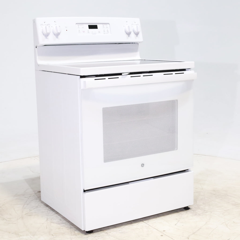 Pictures of White GE 5.3 cu. ft. 4 Element Freestanding Electric Range with Dual Element Baking - Scratch & Dent - Minor - Neu Appliance Outlet - Discount Appliance Outlet in Austin, Tx
