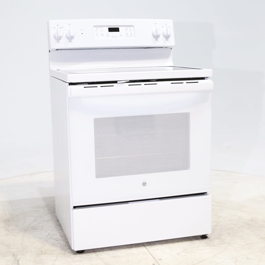 Pictures of White GE 5.3 cu. ft. 4 Element Freestanding Electric Range with Dual Element Baking - Scratch & Dent - Minor - Neu Appliance Outlet - Discount Appliance Outlet in Austin, Tx