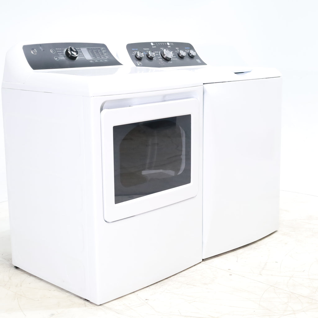Pictures of GE 4.5 cu. ft. Capacity Washer with Stainless Steel Basket, Cold Plus and Wash Boost and GE 7.4 cu. ft. Capacity Electric Dryer with Up To 120 ft. Venting and Sensor Dry - Scratch & Dent - Minor | Moderate - Neu Appliance Outlet - Discount Appliance Outlet in Austin, Tx