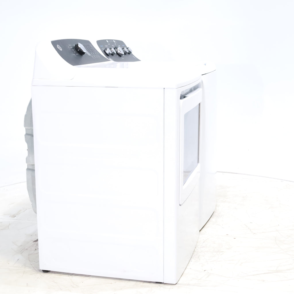 Pictures of GE 4.5 cu. ft. Capacity Washer with Stainless Steel Basket, Cold Plus and Wash Boost and GE 7.4 cu. ft. Capacity Electric Dryer with Up To 120 ft. Venting and Sensor Dry - Scratch & Dent - Minor | Moderate - Neu Appliance Outlet - Discount Appliance Outlet in Austin, Tx