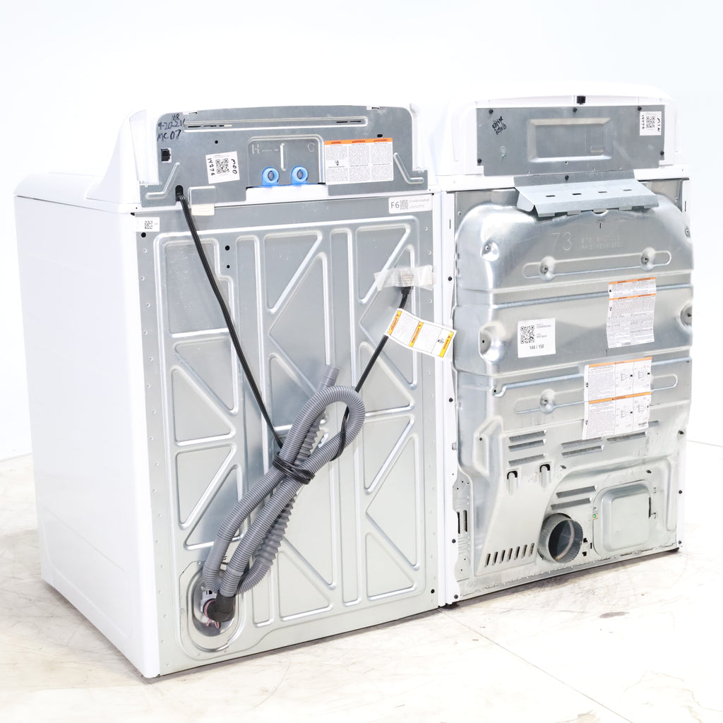 Pictures of GE 4.5 cu. ft. Capacity Washer with Stainless Steel Basket, Cold Plus and Wash Boost and GE 7.4 cu. ft. Capacity Electric Dryer with Up To 120 ft. Venting and Sensor Dry - Scratch & Dent - Minor | Moderate - Neu Appliance Outlet - Discount Appliance Outlet in Austin, Tx