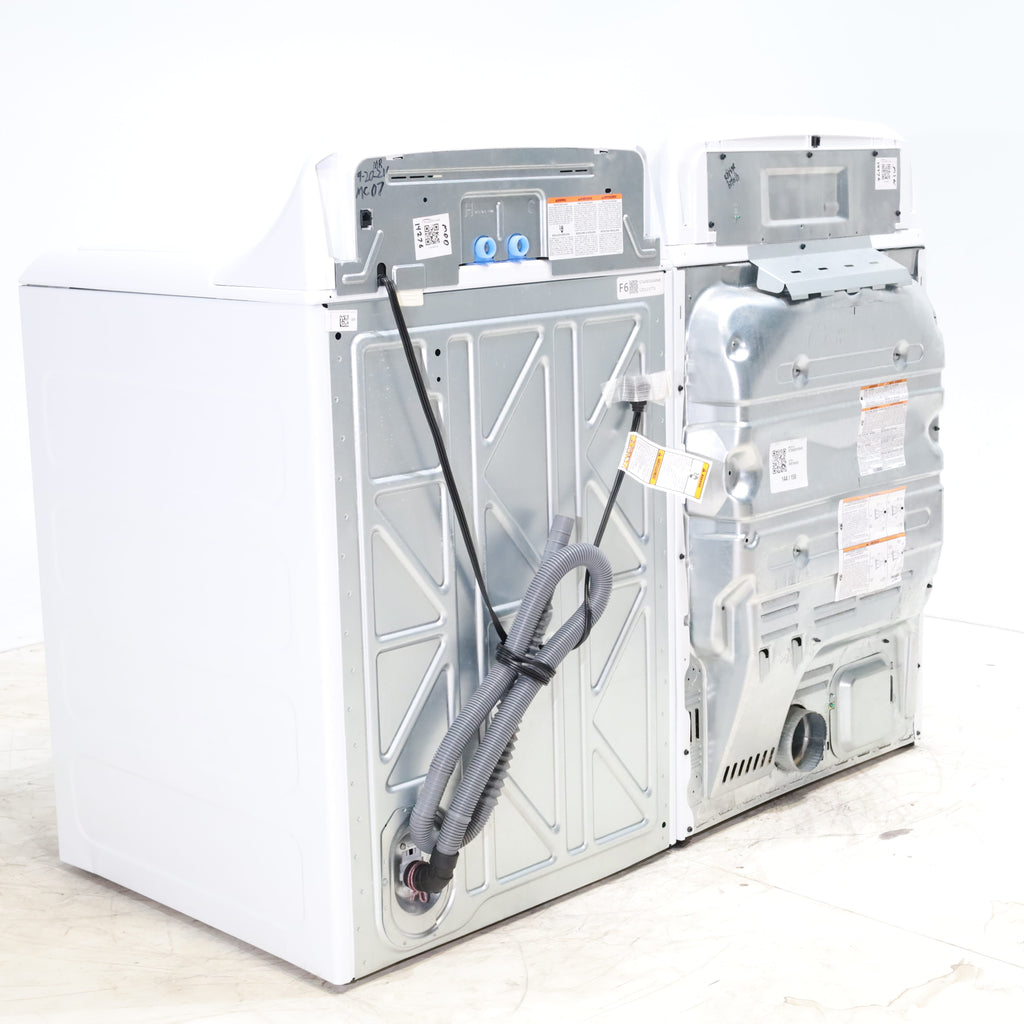 Pictures of GE 4.5 cu. ft. Capacity Washer with Stainless Steel Basket, Cold Plus and Wash Boost and GE 7.4 cu. ft. Capacity Electric Dryer with Up To 120 ft. Venting and Sensor Dry - Scratch & Dent - Minor | Moderate - Neu Appliance Outlet - Discount Appliance Outlet in Austin, Tx