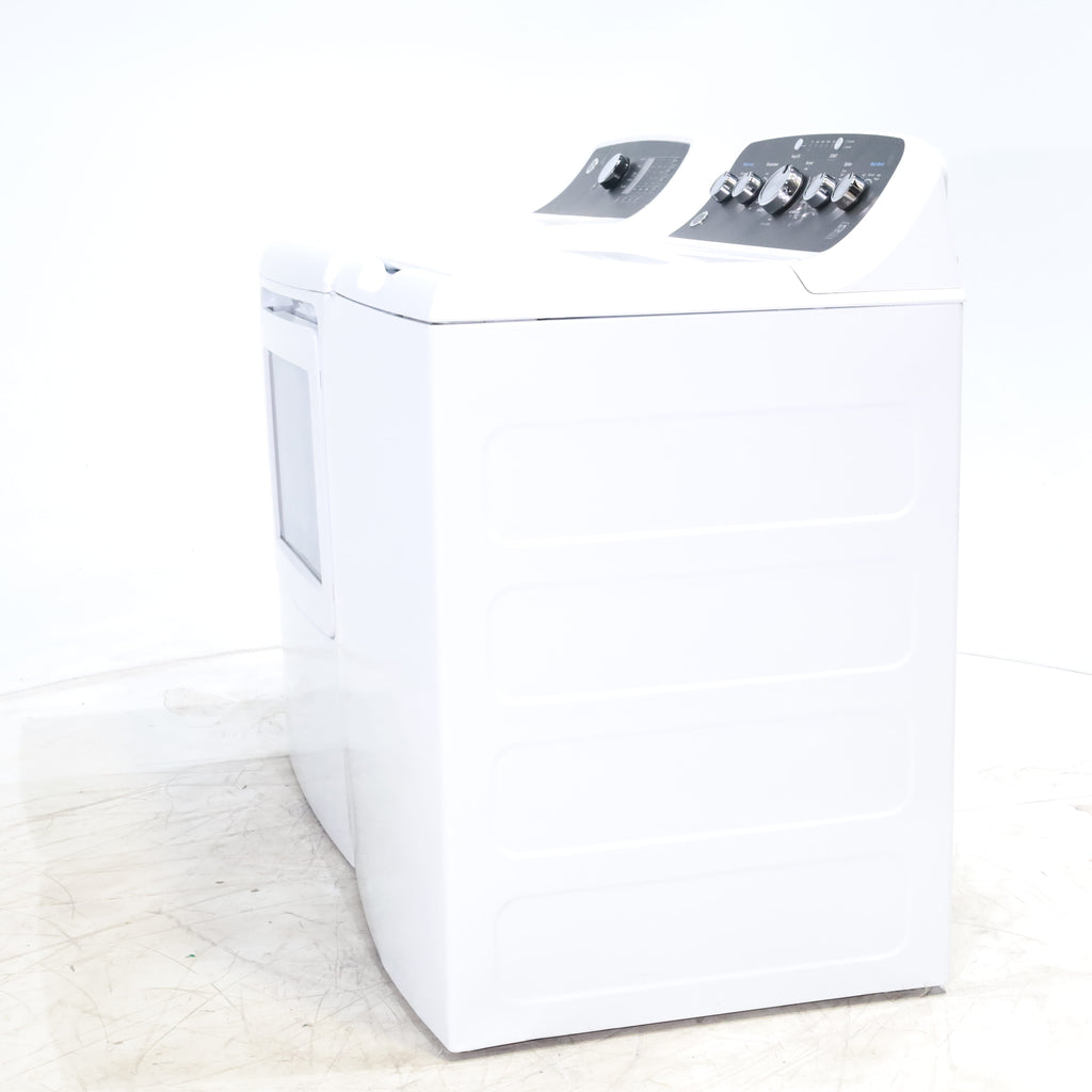 Pictures of GE 4.5 cu. ft. Capacity Washer with Stainless Steel Basket, Cold Plus and Wash Boost and GE 7.4 cu. ft. Capacity Electric Dryer with Up To 120 ft. Venting and Sensor Dry - Scratch & Dent - Minor | Moderate - Neu Appliance Outlet - Discount Appliance Outlet in Austin, Tx