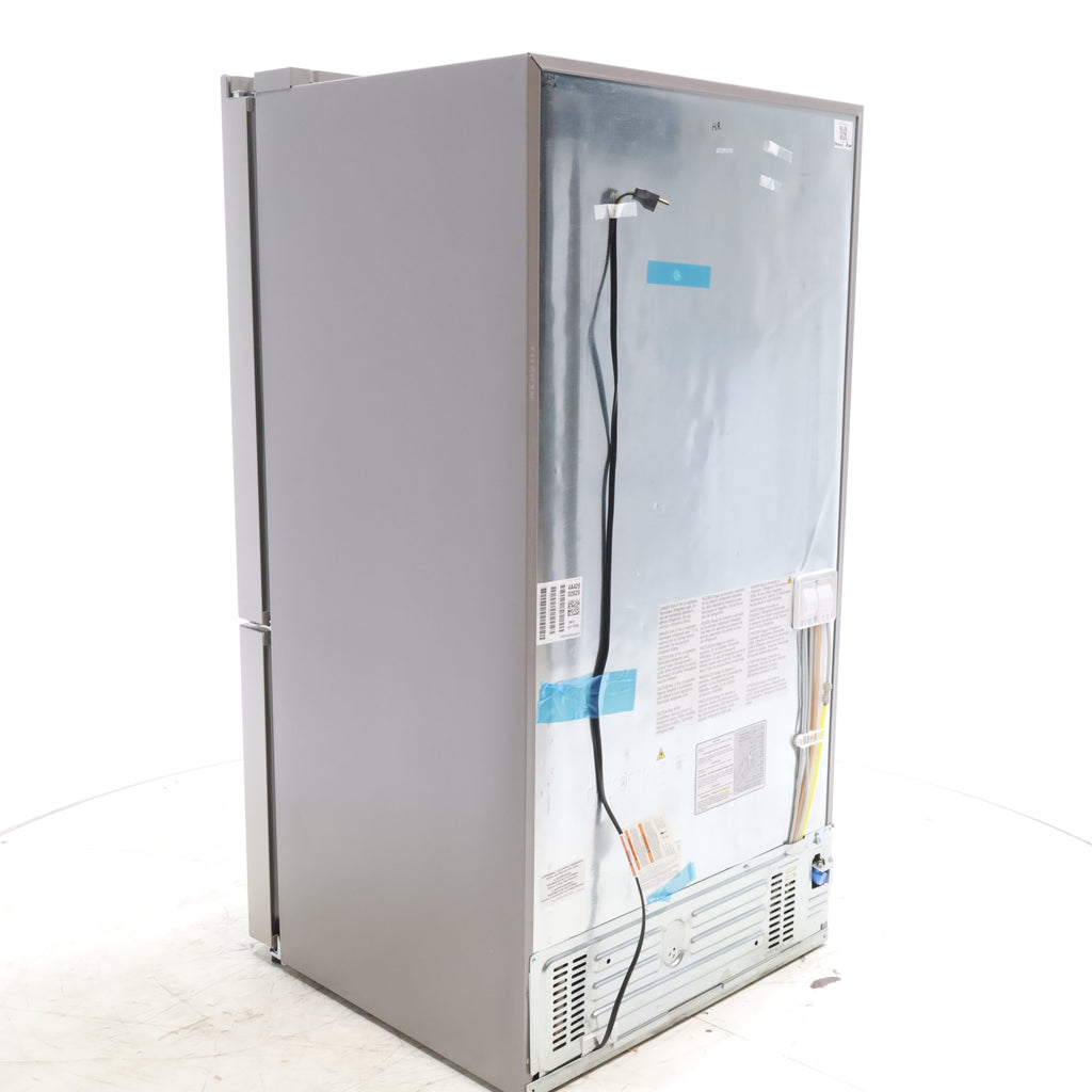 Pictures of Stainless Steel ENERGY STAR Frigidaire 27.8 cu. ft. 3 Door French Door Refrigerator with Exterior Water and Ice Dispenser - Scratch & Dent - Minor - Neu Appliance Outlet - Discount Appliance Outlet in Austin, Tx