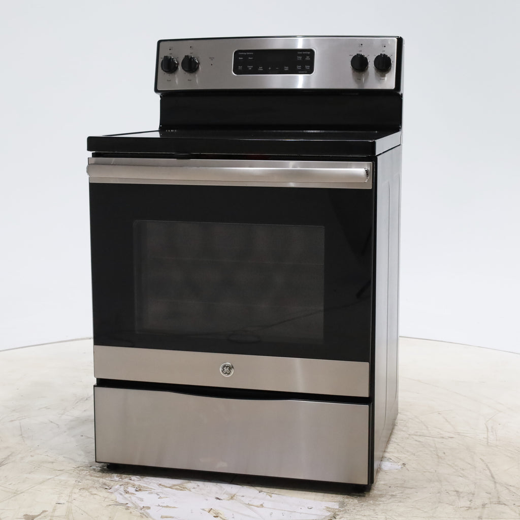 Pictures of GE Stainless Steel & Black Free-Standing Electric Range with 8" Power Boil Element - Certified Refurbished - Neu Appliance Outlet - Discount Appliance Outlet in Austin, Tx