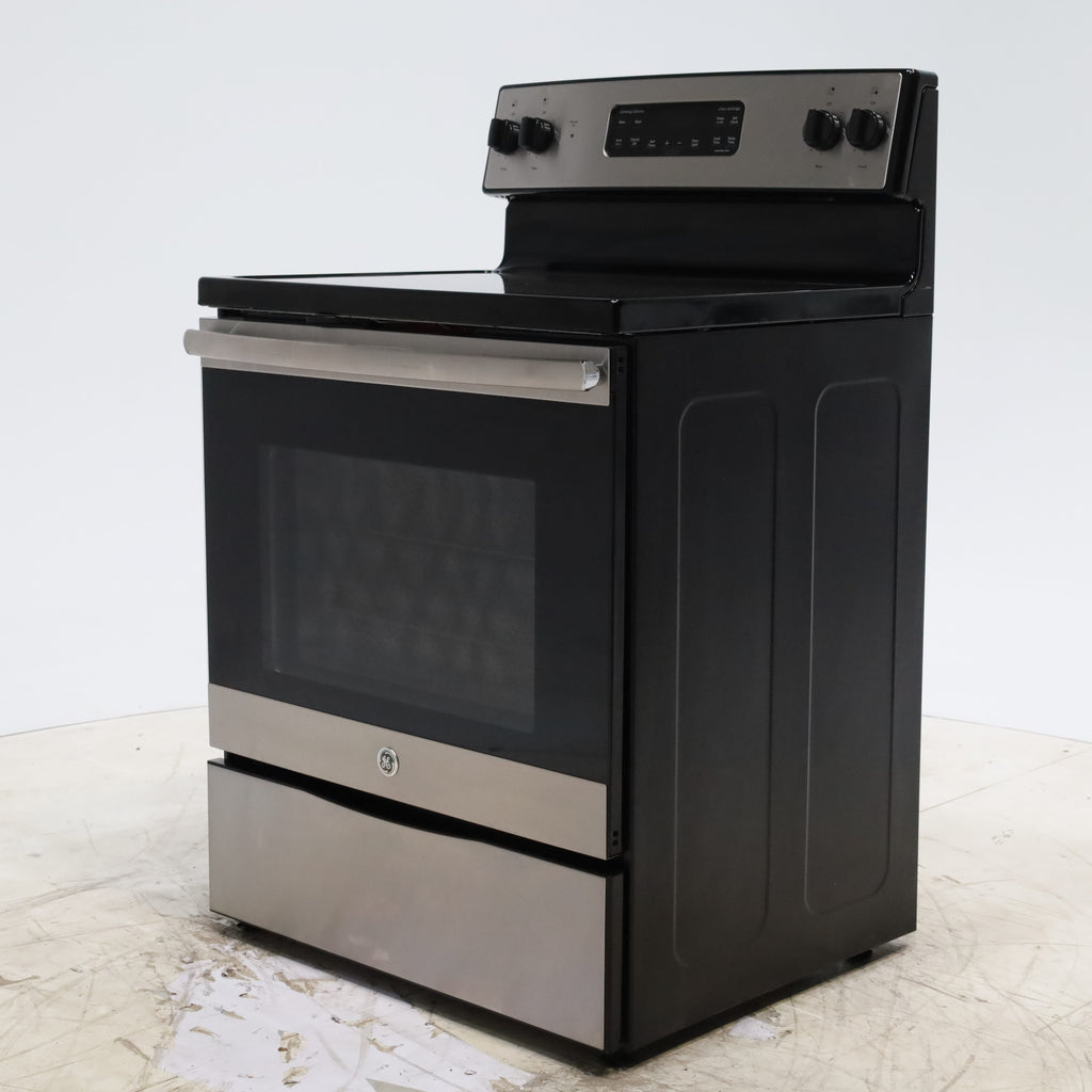 Pictures of GE Stainless Steel & Black Free-Standing Electric Range with 8" Power Boil Element - Certified Refurbished - Neu Appliance Outlet - Discount Appliance Outlet in Austin, Tx
