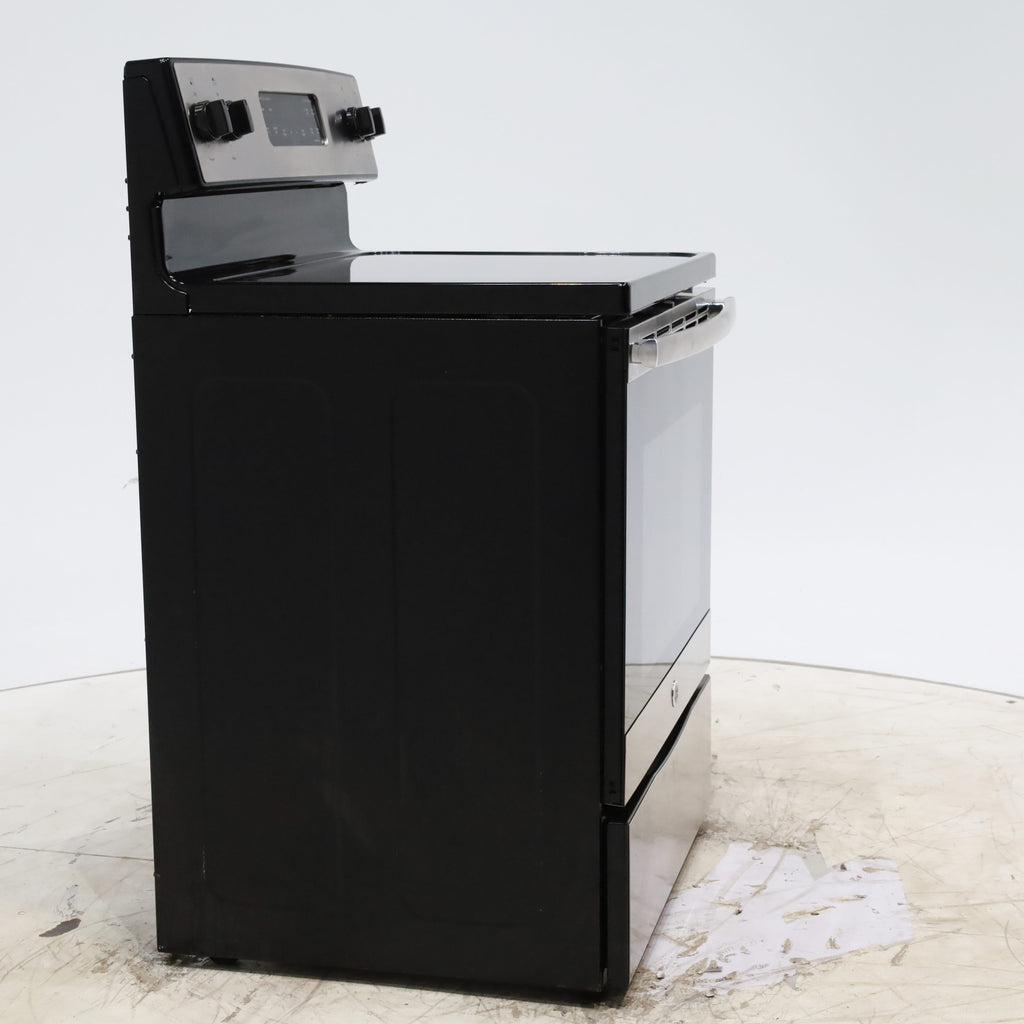 Pictures of GE Stainless Steel & Black Free-Standing Electric Range with 8" Power Boil Element - Certified Refurbished - Neu Appliance Outlet - Discount Appliance Outlet in Austin, Tx
