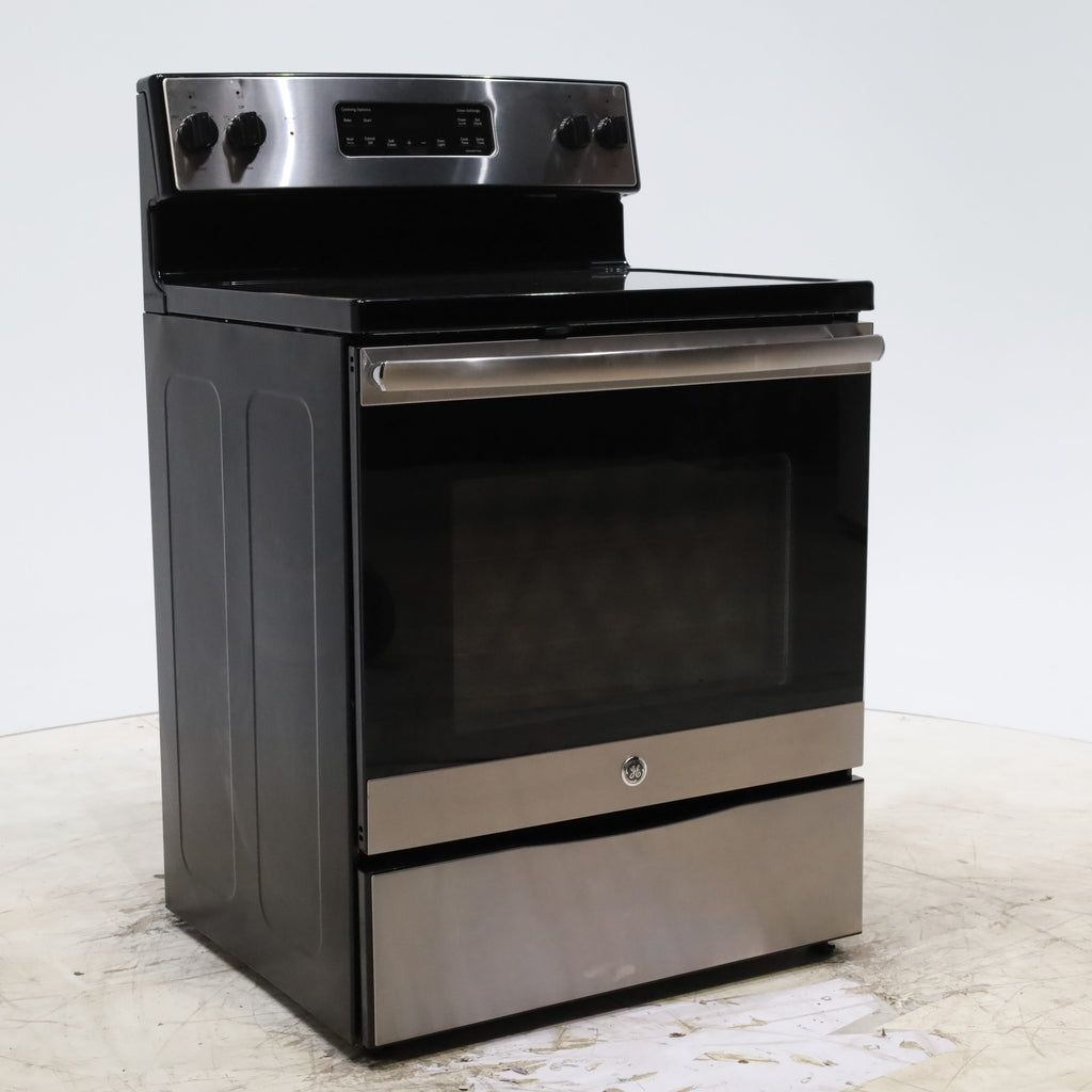 Pictures of GE Stainless Steel & Black Free-Standing Electric Range with 8" Power Boil Element - Certified Refurbished - Neu Appliance Outlet - Discount Appliance Outlet in Austin, Tx