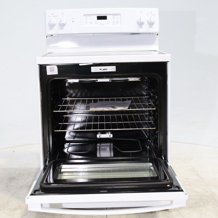 Pictures of White GE 5.3 cu. ft. 4 Element Freestanding Electric Range with Dual Element Baking - Scratch & Dent - Minor - Neu Appliance Outlet - Discount Appliance Outlet in Austin, Tx