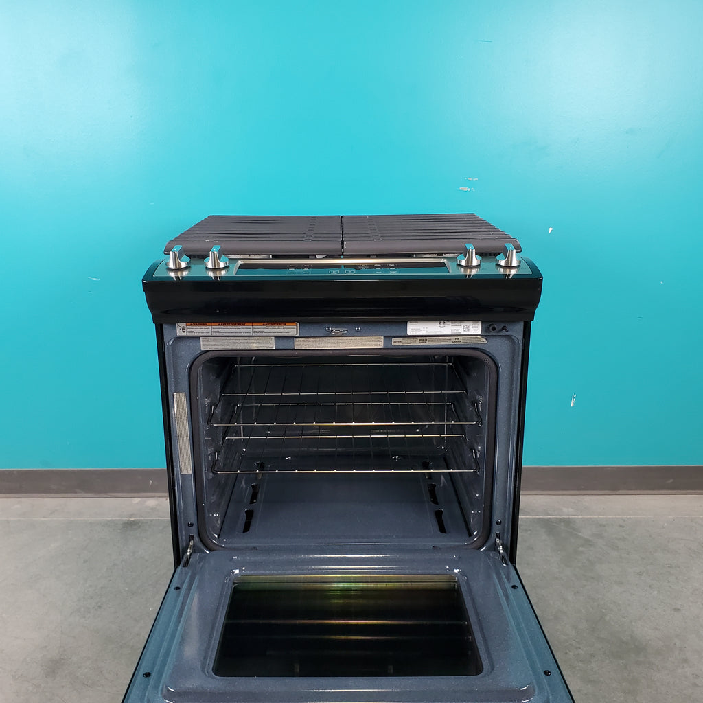 Pictures of Fingerprint Resistant Stainless Steel Whirlpool 5.0 cu. ft. 4 Burner Slide In Gas Range with Frozen Bake Technology - Scratch & Dent - Minor - Neu Appliance Outlet - Discount Appliance Outlet in Austin, Tx