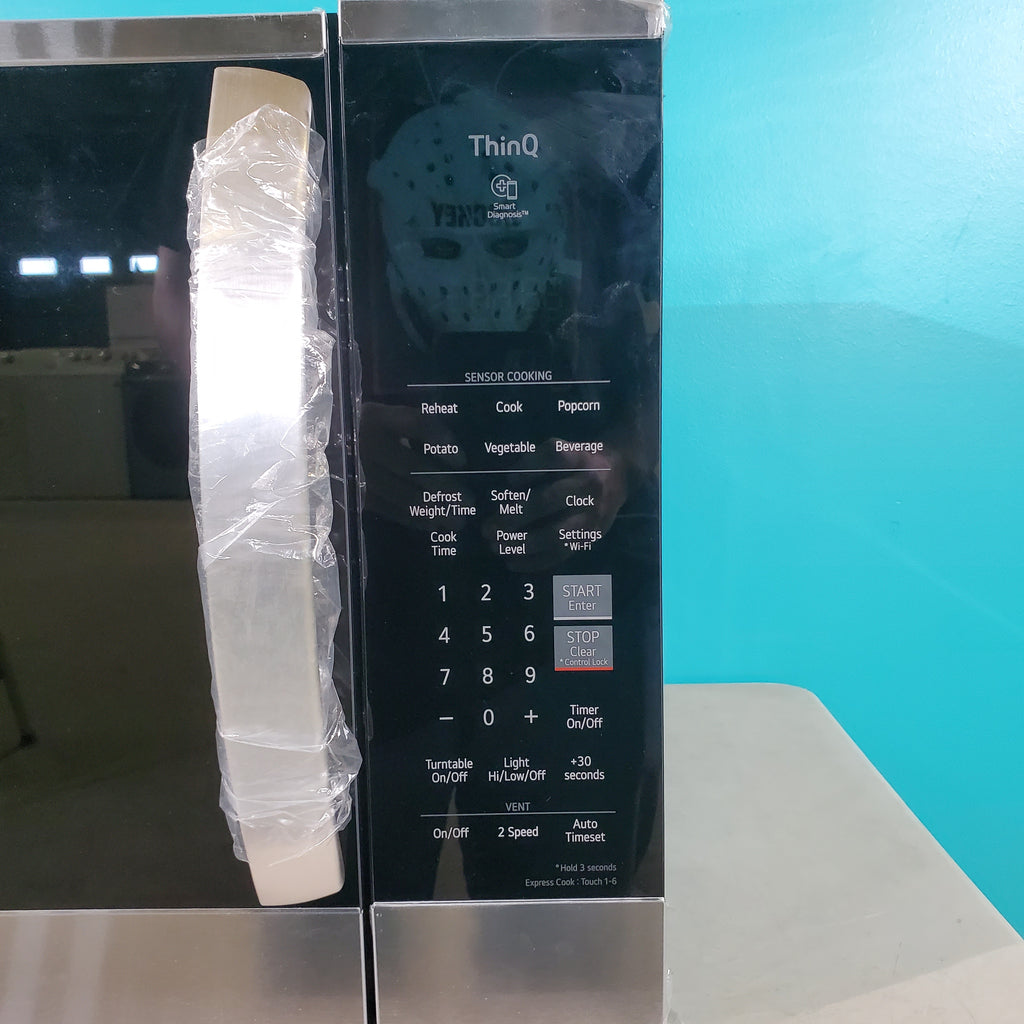 Pictures of PrintProof Stainless Steel LG 1.8 cu. ft. Over The Range Microwave with Scan-to-Cook - Scratch & Dent - Minor - Neu Appliance Outlet - Discount Appliance Outlet in Austin, Tx