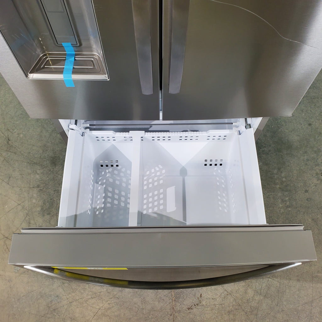 Pictures of Stainless Steel ENERGY STAR Frigidaire 27.8 cu. ft. 3 Door French Door Refrigerator with Exterior Water and Ice Dispenser - Scratch & Dent - Minor - Neu Appliance Outlet - Discount Appliance Outlet in Austin, Tx