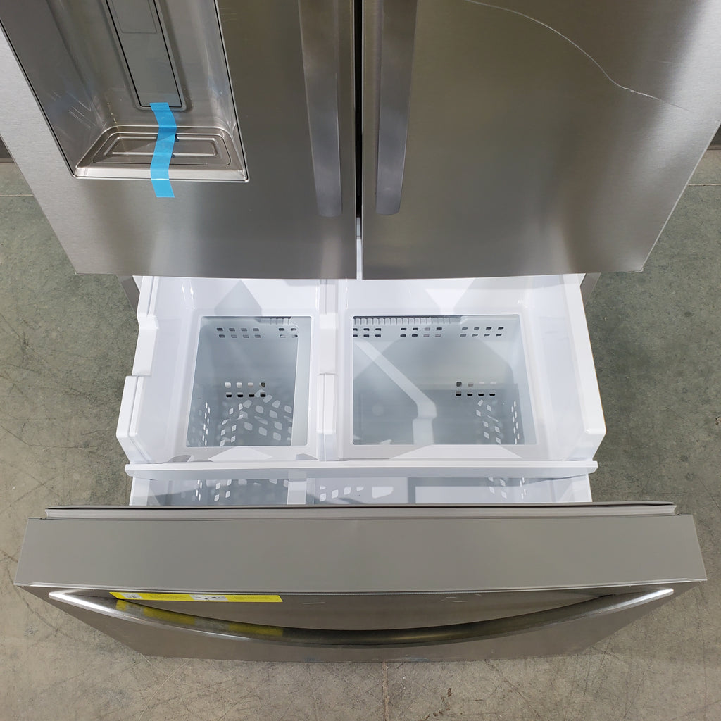 Pictures of Stainless Steel ENERGY STAR Frigidaire 27.8 cu. ft. 3 Door French Door Refrigerator with Exterior Water and Ice Dispenser - Scratch & Dent - Minor - Neu Appliance Outlet - Discount Appliance Outlet in Austin, Tx