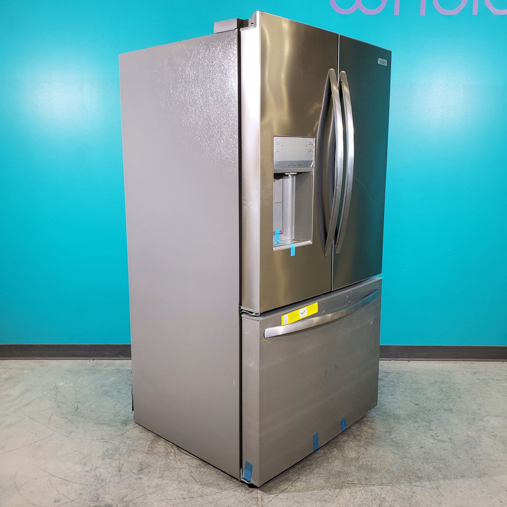 Pictures of Stainless Steel ENERGY STAR Frigidaire 27.8 cu. ft. 3 Door French Door Refrigerator with Exterior Water and Ice Dispenser - Scratch & Dent - Minor - Neu Appliance Outlet - Discount Appliance Outlet in Austin, Tx