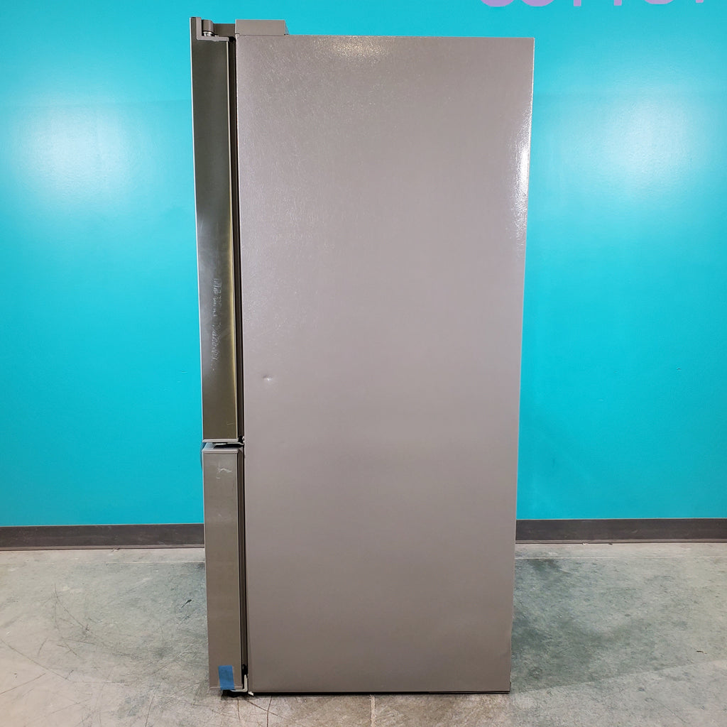 Pictures of Stainless Steel ENERGY STAR Frigidaire 27.8 cu. ft. 3 Door French Door Refrigerator with Exterior Water and Ice Dispenser - Scratch & Dent - Minor - Neu Appliance Outlet - Discount Appliance Outlet in Austin, Tx