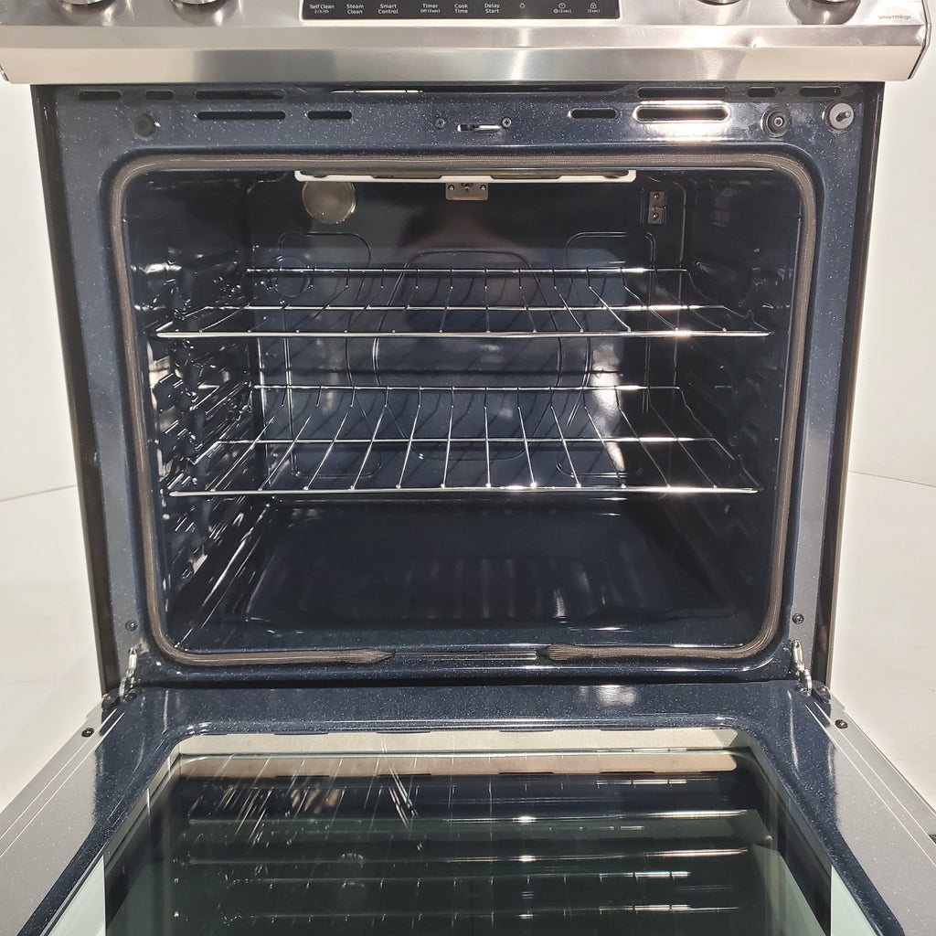 Pictures of Fingerprint Resistant Stainless Samsung 6.3 cu ft 5 Heating Element Smooth Cooktop Smart Slide In Electric Range with Smart Wifi Connectivity - Scratch & Dent - Moderate - Neu Appliance Outlet - Discount Appliance Outlet in Austin, Tx