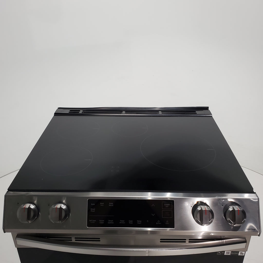 Pictures of Fingerprint Resistant Stainless Samsung 6.3 cu ft 5 Heating Element Smooth Cooktop Smart Slide In Electric Range with Smart Wifi Connectivity - Scratch & Dent - Moderate - Neu Appliance Outlet - Discount Appliance Outlet in Austin, Tx