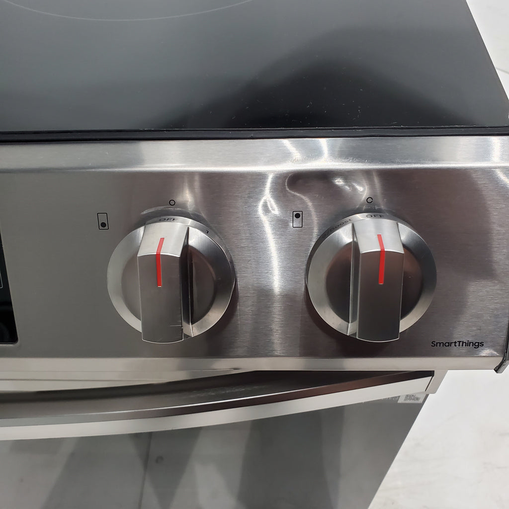 Pictures of Fingerprint Resistant Stainless Samsung 6.3 cu ft 5 Heating Element Smooth Cooktop Smart Slide In Electric Range with Smart Wifi Connectivity - Scratch & Dent - Moderate - Neu Appliance Outlet - Discount Appliance Outlet in Austin, Tx