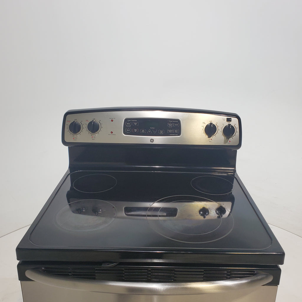 Pictures of Stainless Steel GE 5.3 cu. ft. 4 Heating Element Freestanding Range with Ceramic Glass Cooktop - Certified Refurbished - Neu Appliance Outlet - Discount Appliance Outlet in Austin, Tx