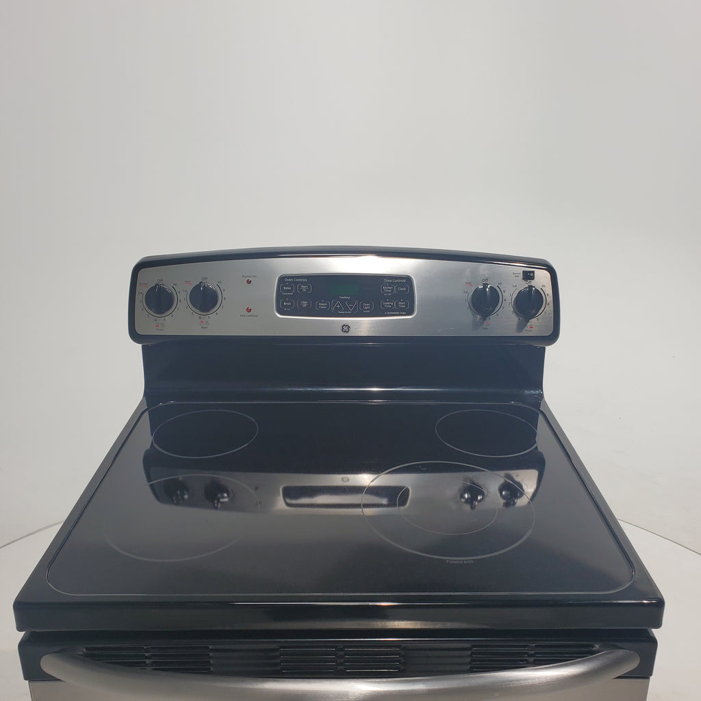 Pictures of Stainless Steel GE 5.3 cu. ft. 4 Heating Element Freestanding Range with Ceramic Glass Cooktop - Certified Refurbished - Neu Appliance Outlet - Discount Appliance Outlet in Austin, Tx