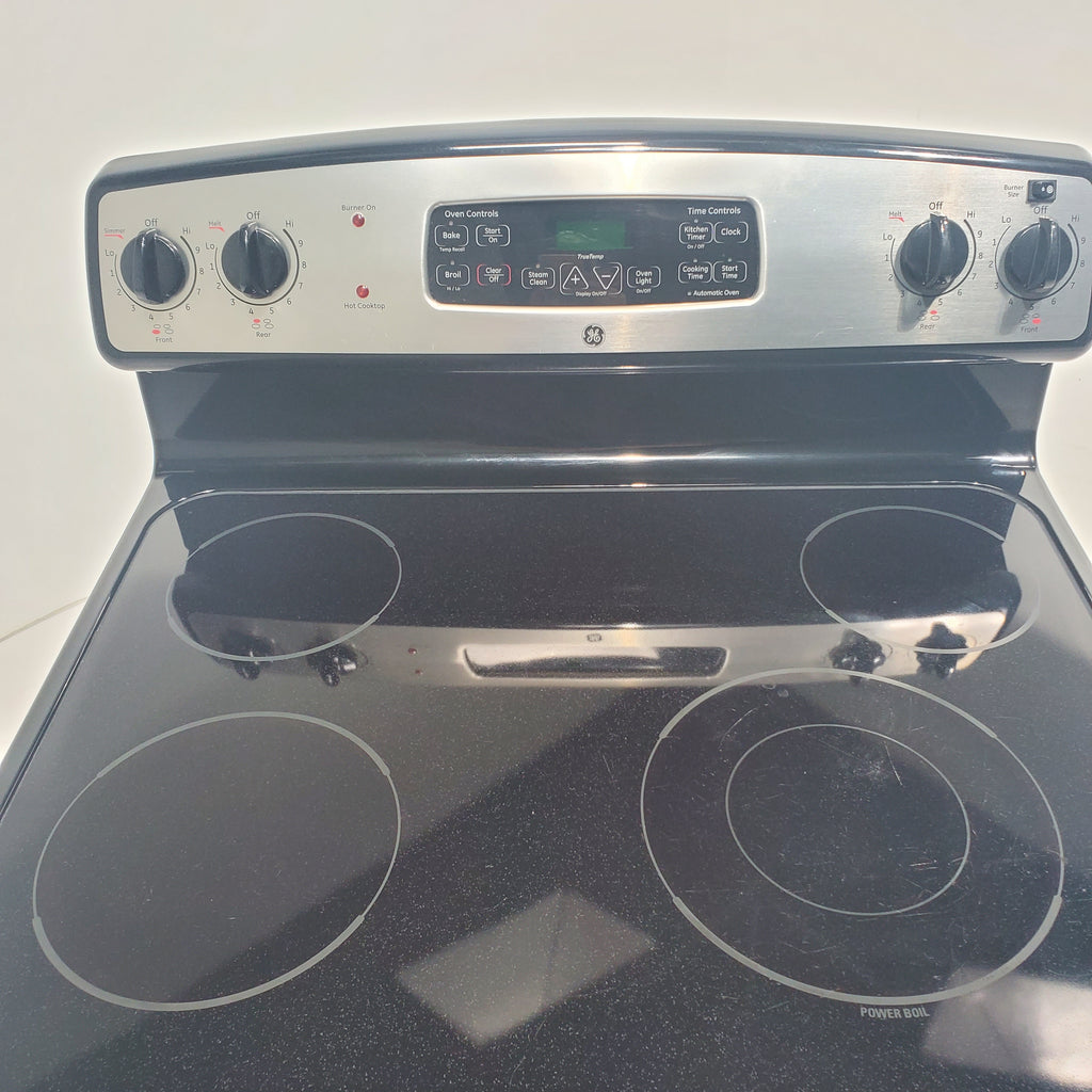 Pictures of Stainless Steel GE 5.3 cu. ft. 4 Heating Element Freestanding Range with Ceramic Glass Cooktop - Certified Refurbished - Neu Appliance Outlet - Discount Appliance Outlet in Austin, Tx