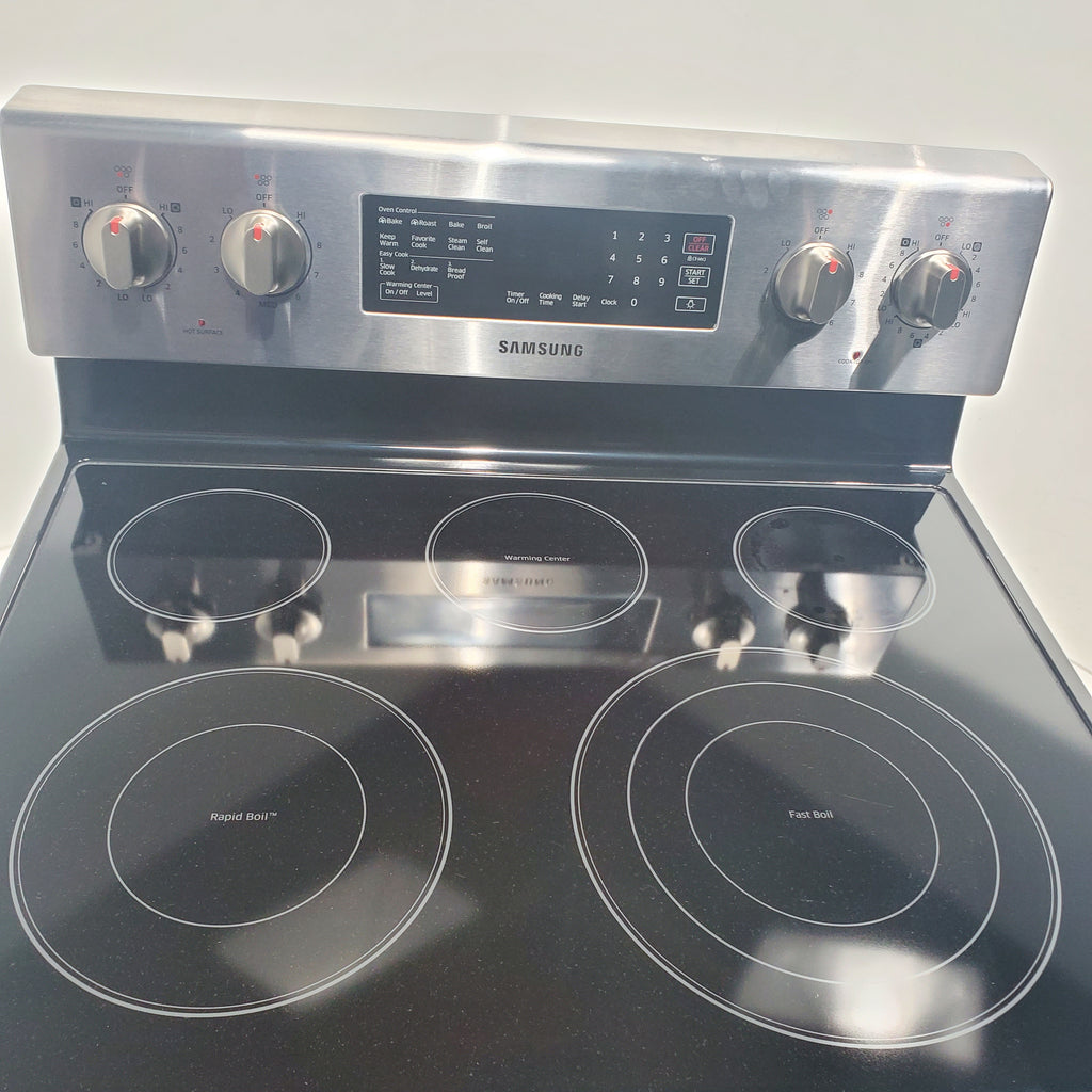 Pictures of Stainless Steel Samsung 5.9 cu. ft. Freestanding 5 Heating Element Smooth Cooktop Electric Range with True Convection  - Certified Refurbished - Neu Appliance Outlet - Discount Appliance Outlet in Austin, Tx