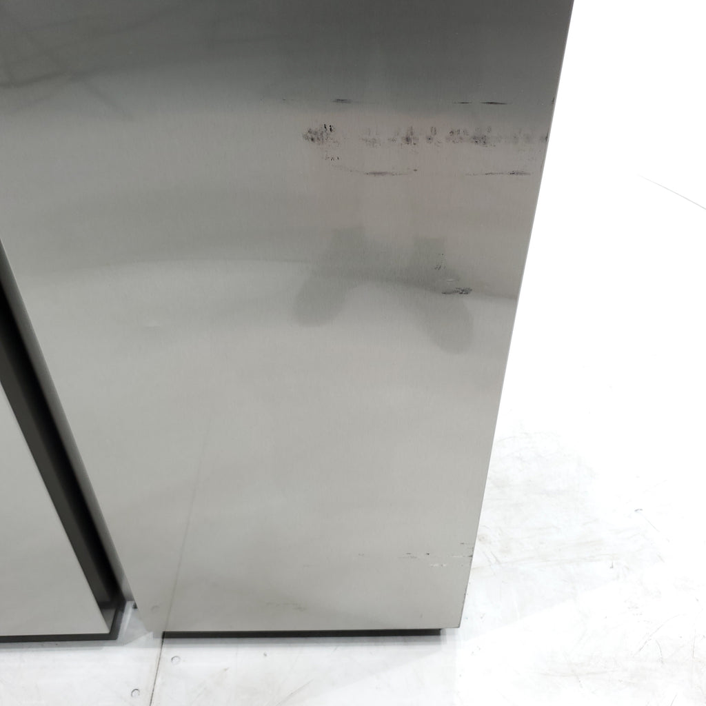 Pictures of Fingerprint Resistant Stainless Steel ENERGY STAR Samsung 27.4 cu. ft. Side by Side Refrigerator with Exterior Water and Ice Dispenser - Scratch & Dent - Moderate - Neu Appliance Outlet - Discount Appliance Outlet in Austin, Tx