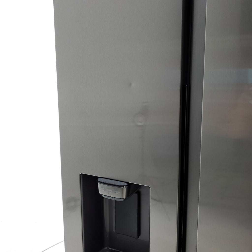 Pictures of Fingerprint Resistant Stainless Steel ENERGY STAR Samsung 27.4 cu. ft. Side by Side Refrigerator with Exterior Water and Ice Dispenser - Scratch & Dent - Moderate - Neu Appliance Outlet - Discount Appliance Outlet in Austin, Tx